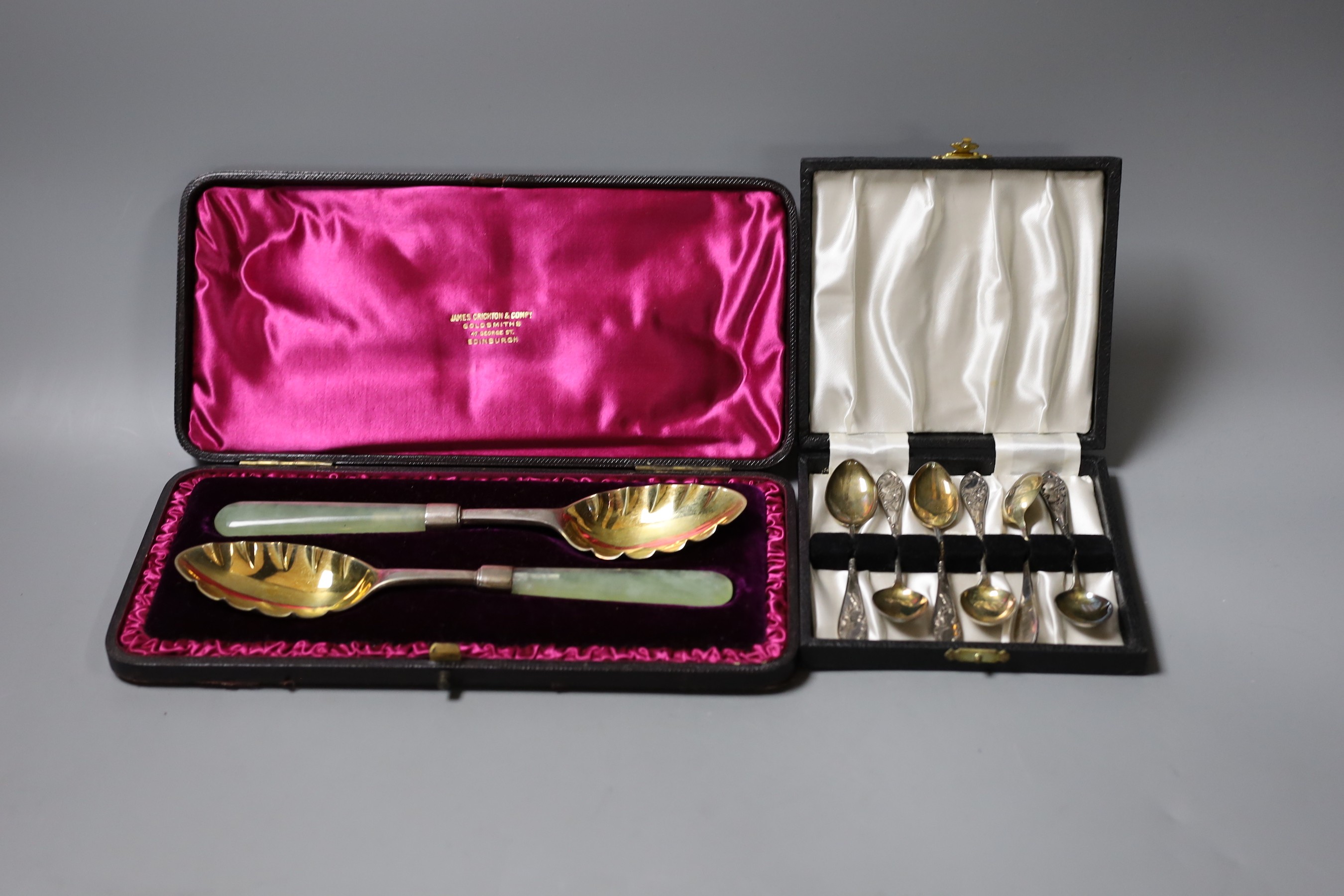 A cased pair of Victorian bowenite handled silver serving spoons, Edinburgh, 1888 and a cased set of six silver teaspoons.